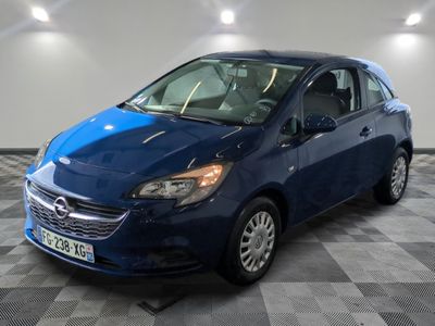 a picture of a blue car parked in a garage
