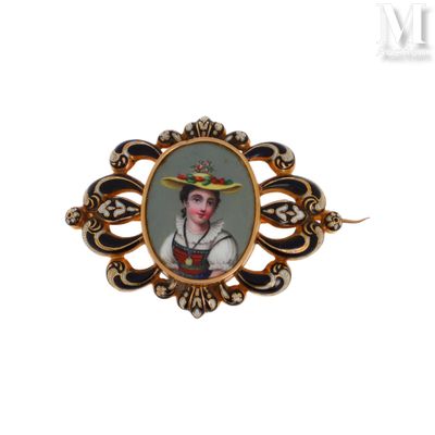 une image représentant une femme portant un chapeau, sur une broche