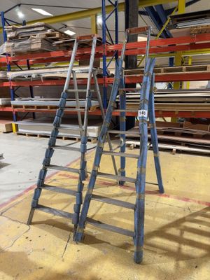 a ladder that is sitting in the middle of a room