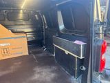 the back of a van with a tv in the back of it