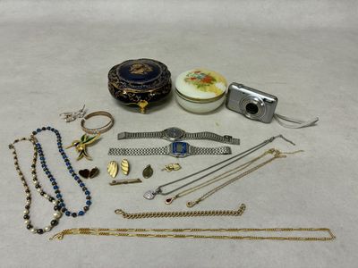 a lot of jewelry that is laying out on the table