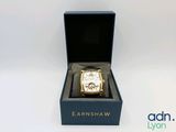 an image of a watch in a box on a white surface