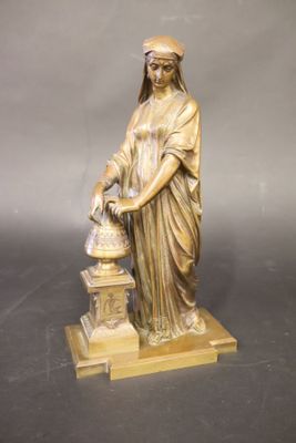 BOURET La porteuse d'eau Statuette en bronze à patine brune …