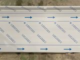 an overhead view of a sign with arrows pointing in different directions