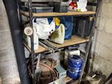 a room with a bunch of items on the shelves