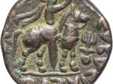 an ancient coin with a horse and rider on it
