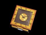 a clock that is sitting on top of a wooden box