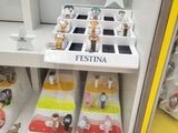 a display case with a lot of perfumes on it