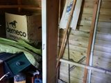 a small room with a ladder and a bed in it