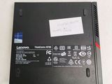 a laptop that has a sticker on the back of it