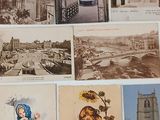 many old postcards on the wall of this room