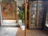 a lamp that is sitting on the floor in the room