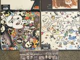 the led zeppelin albums are laid out on the floor