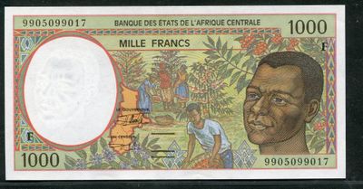 a close up of a bank note with a picture of a man on it