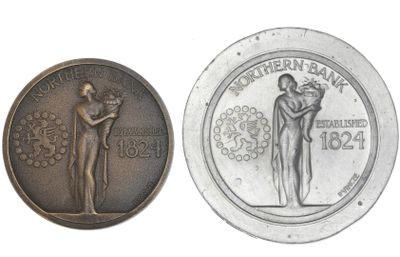 an image of a coin with a woman holding a baby on it