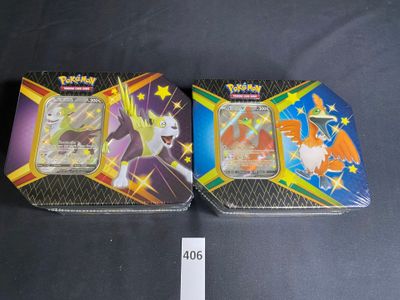 two pokemon trading cards are sitting on a table