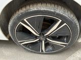a close up of a tire on a car ' s rim