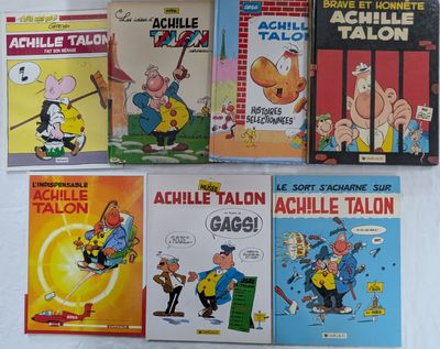 Plusieurs bandes dessinées sont alignées les unes à côté des autres sur une surface blanche
