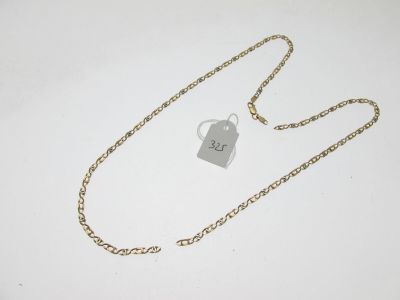 un gros plan d'une chaîne à laquelle est accroché un cadenas