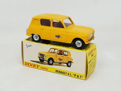 a yellow toy car sitting on top of a box