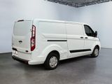 a white van that is parked in a room