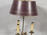 an image of a table lamp with a purple shade on it