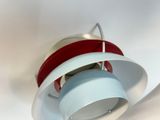 a light that is hanging from the ceiling in the room