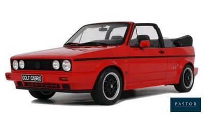 the red car is parked on a white surface with a white background