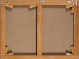 an old wooden frame with two canvass and a piece of wood