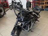 a motorcycle that is parked inside of a building