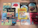 many children ' s books that are on a table