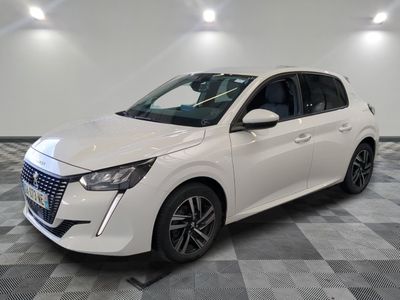 the white car is parked in a large room with a checkered floor