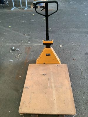 a pallet that is sitting in the middle of a parking lot