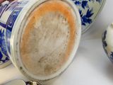 a person pouring a cup of coffee on a table
