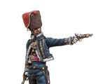a figurine of a man with a gun in his hand