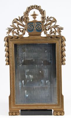 a gold frame with a picture of a horse in it