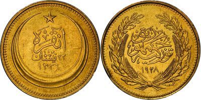 two gold coins with arabic writing on them