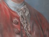 portrait of a man in a red coat and white hair