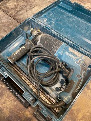 a tool in a case that is sitting on the floor