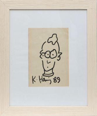 une image représentant le dessin d'un homme à lunettes dans un cadre