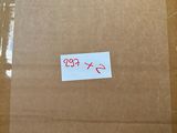 a cardboard box with a sticker on it sitting on a table