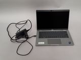 a laptop computer that is connected to a charger