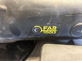 a close up of a car ' s dashboard with a car tools sticker on it
