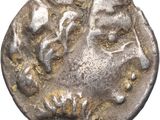 une pièce d'argent portant une tête d'homme