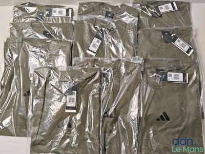 Six paires de pantalons Adidas pour homme sont emballées dans du plastique
