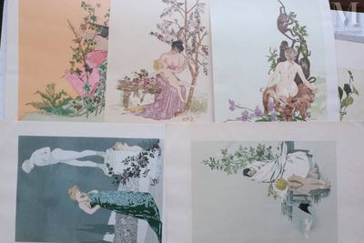 four cards with pictures of women and birds on them sitting on a table