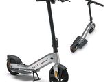 two scooters that are sitting next to each other