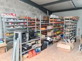 a room with a lot of boxes and boxes on the shelves