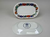 a white plate with a colorful floral design on it