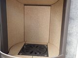a stove that has a fan inside of it